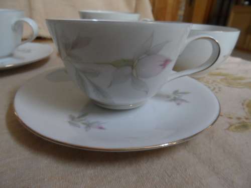 Bavaria 3 cups and 5 saucers 1 sugar bowl  cups stamped 615