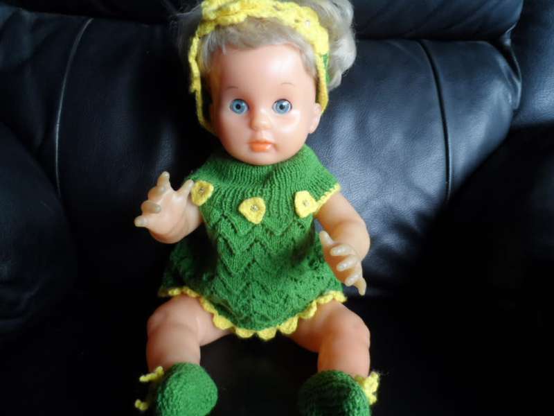 Beautiful condition First Love doll with green outfit and she will also have original outfit with he