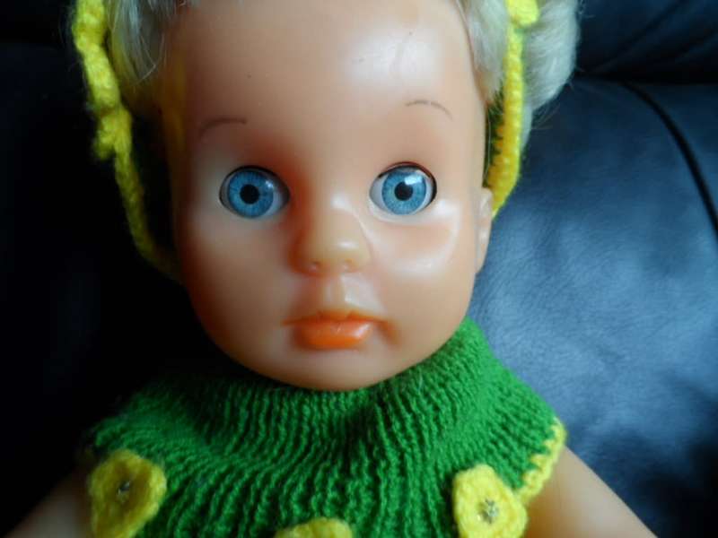 Beautiful condition First Love doll with green outfit and she will also have original outfit with he