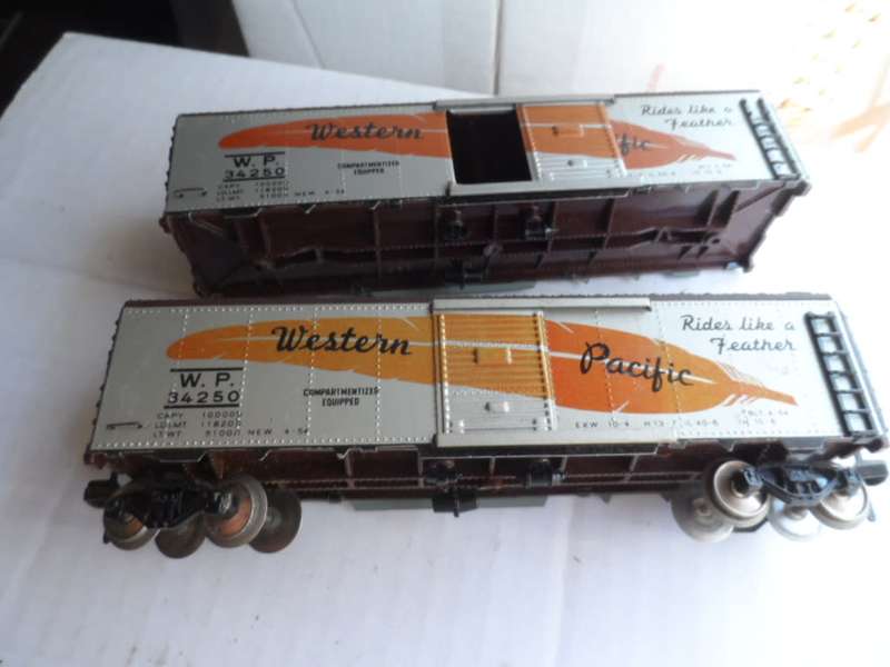 TWO VINTAGE FLEISCHMANN HO BOX CAR. METAL SIDES, SLIDING DOORS, METAL WHEELS. ONE BID FOR BOTH.