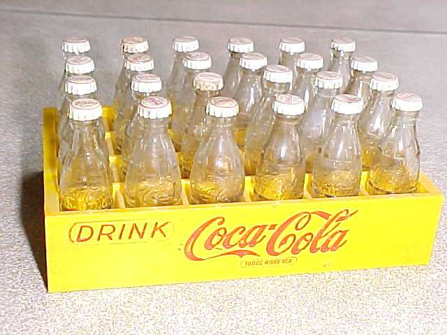 PLASTIC CRATE WITH GLASS COKE BOTTLES