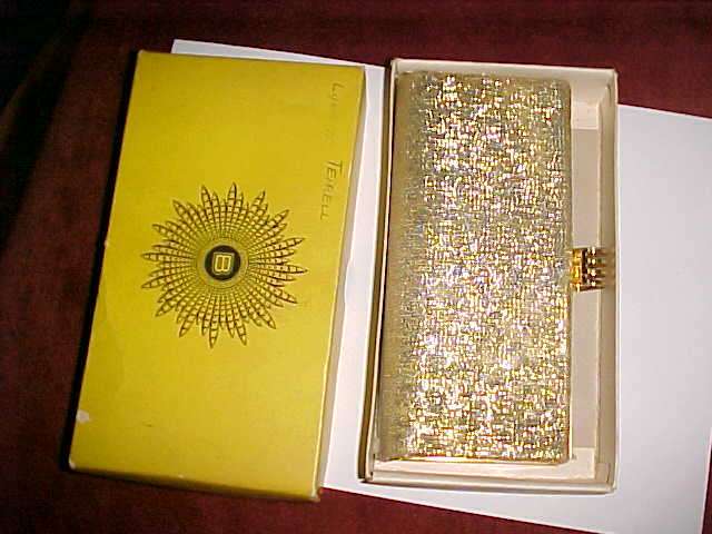 Stunning Lady Buxton gold evening purse bag in box