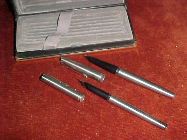 Pair of Parker fountain pens untested one has name inscribed
