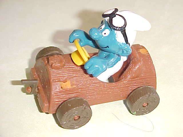 SMURF WITH LOG CAR