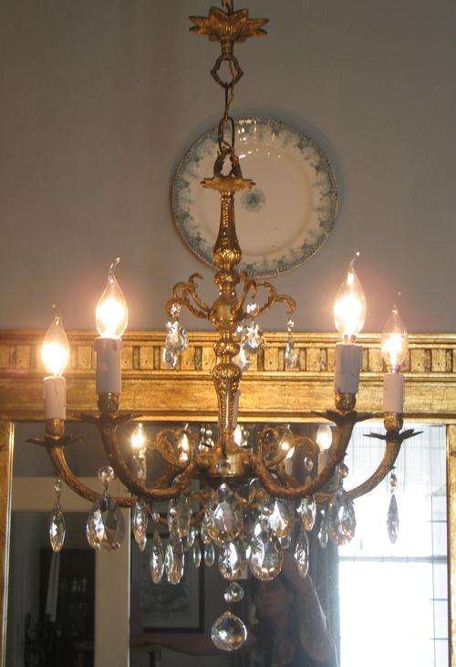 Vintage French five light brass and crystal chandelier