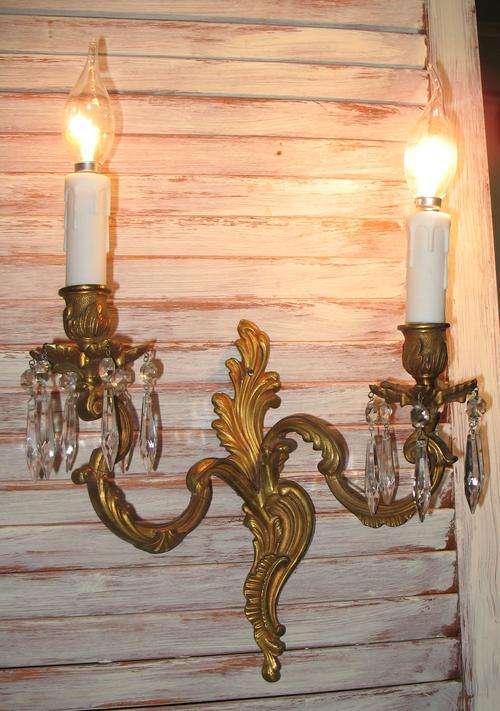 Vintage French bronze pair of matching double wall lights with crystals