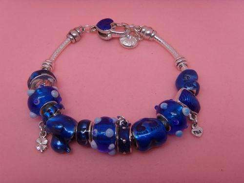 STUNNING!! 925 SILVER CHARM BRACELET. METALLIC BLUE.
