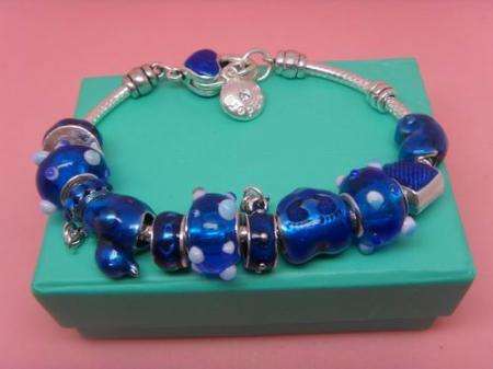 STUNNING!! 925 SILVER BRACELET WITH GLASS BEADS & CHARMS. METALLIC BLUE.