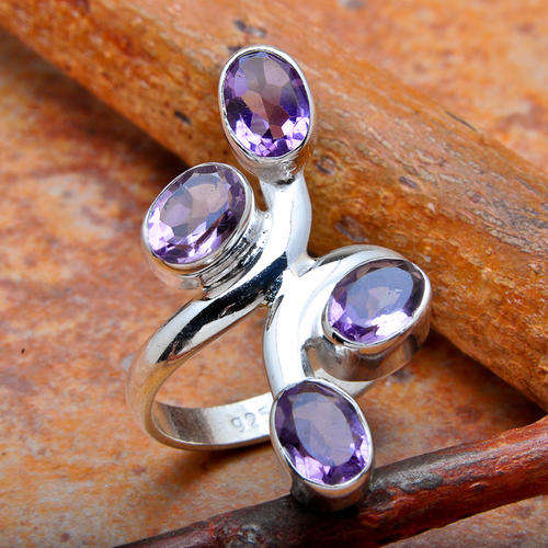 STUNNING RING IN SOLID 925 STERLING SILVER WITH GENUINE AMETHYSTS. SIZE 7.