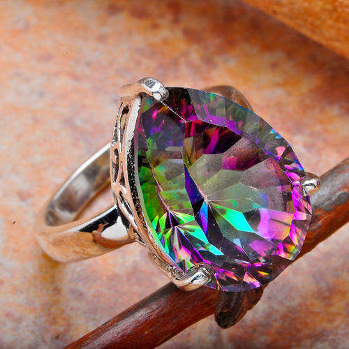 EXQUISITE LARGE PEAR SHAPED MYSTIC TOPAZ IN SOLID 925 STERLING SILVER. SIZE 7.25.