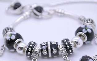 STUNNING PANDO BRACELET WITH BLACK CHARM BEADS IN 925 STERLING SILVER . (alloy filled)