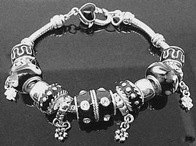 STUNNING BRACELET WITH BLACK CHARM BEADS IN 925 STERLING SILVER . (alloy filled)