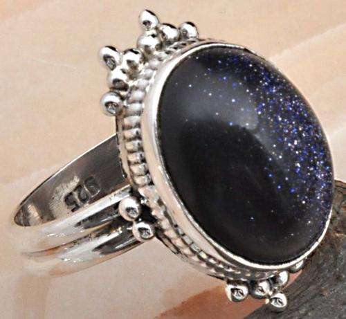 SOLID 925 STERLING SILVER WITH BLUE GOLDSTONE. SIZE 7 1/2.