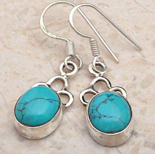 PRETTY  EARRINGS IN SOLID 925 STERLING SILVER WITH TURQUOISE.