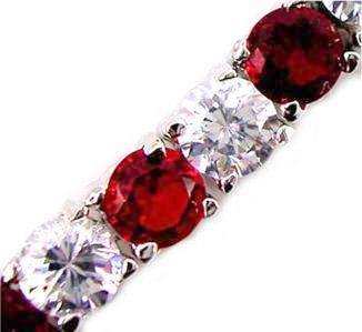 **VALENTINES** EXQUISITE 18CT. WHITE GOLD PLATED TENNIS BRACELET WITH RUBY/DIAMOND CZ. 7" / 18 cms.