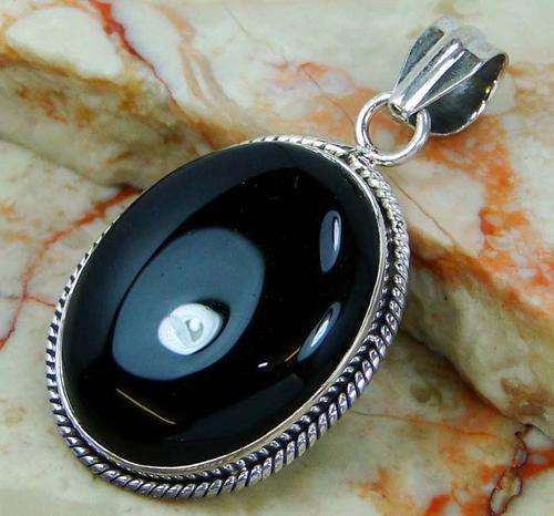 EXQUISITE SOLID 925 SILVER & BLACK ONYX PENDANT. LENGTH 53 mm.
