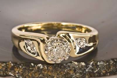 EXQUISITE 3 DIAMOND 0.06 cts.RING IN SOLID 9 ct GOLD. Birmingham U.K. Hallmarked. SIZE 5.5.