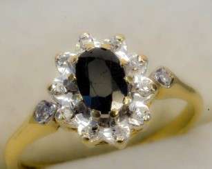 STUNNING SOLID 9ct GOLD RING WITH DARK BLUE SAPPHIRE & DIAMOND CLUSTER. SIZE 7.25 ~O.