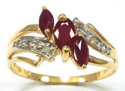 LOVELY RING IN SOLID 9CT GOLD WITH GENUINE RUBIES & DIAMONDS. SIZE 7. HALLMARKED.