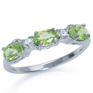 SOLID SILVER RING WITH REAL PERIDOTS & WHITE TOPAZ. SIZE 7