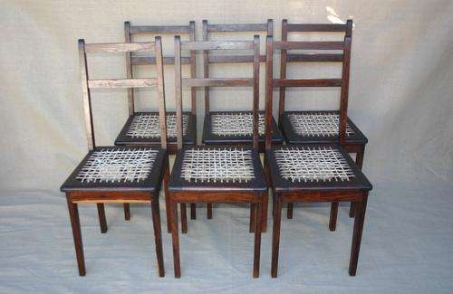 Set of  6 Tamboti wood chairs with riempies