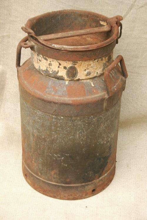 Medium size milk can - 49cm high x 30cm in diameter (bottom)