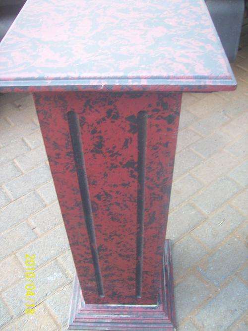 One morden column, wine red and black.