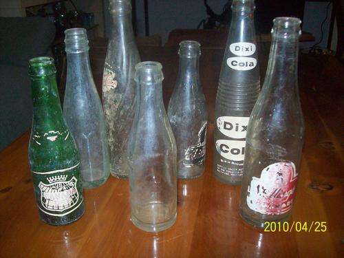 7 old cooldrink bottles