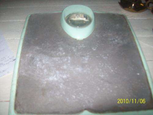 Green bathroom scale