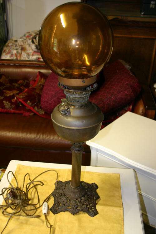 Antique copper paraffine lamp converted to electricity