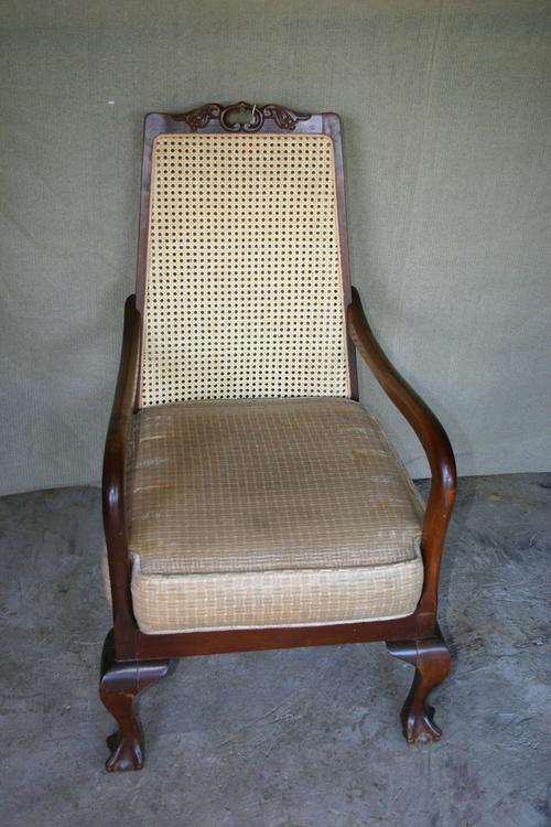Ball & claw easy chair with new cane backrest.
