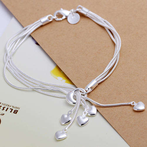 This 925 sterling silver plated 5 string bracelet with hearts looks stunning on - *Anti-allergic*