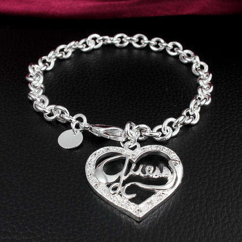 925 Sterling silver plated heart charm bracelet with Guess wording - Stunning
