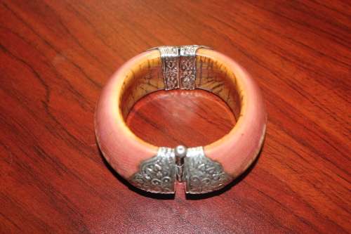 Antique Indian Ivory Cuff Bracelet, tooled Sterling Silver fittings with Buddha Motif circa 1800s