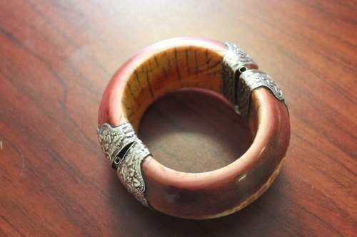 Antique Indian Ivory Cuff Bracelet, tooled Sterling Silver fittings with Buddha Motif circa 1800s