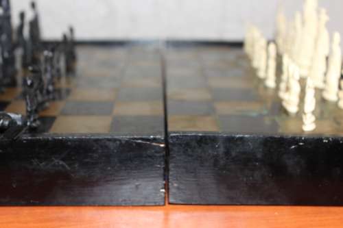 ANTIQUE CHINESE HANDCARVED and STAINED BONE CHESS SET WITH LACQUERED WOODEN BOARD/CASE 34 BY 35 CM