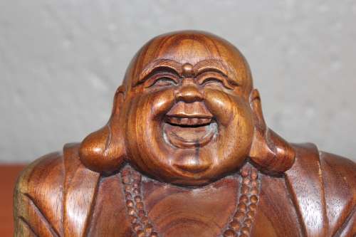 VINTAGE HANDCARVED HARDWOOD CHINESE BUDDHA 17CM TALL BY 18CM