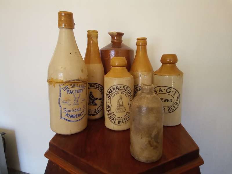 Collection of 7 Antique Stoneware, Ginger Beer and Spring Water Bottles