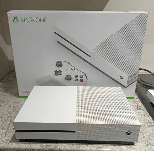 500GB XBox One S with 2 controllers, headset and 11 games for sale.