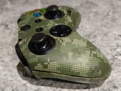 500GB XBox One S with 2 controllers, headset and 11 games for sale.
