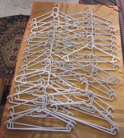 Bulk Lot of 38 white plastic coat hangers in excellent condition