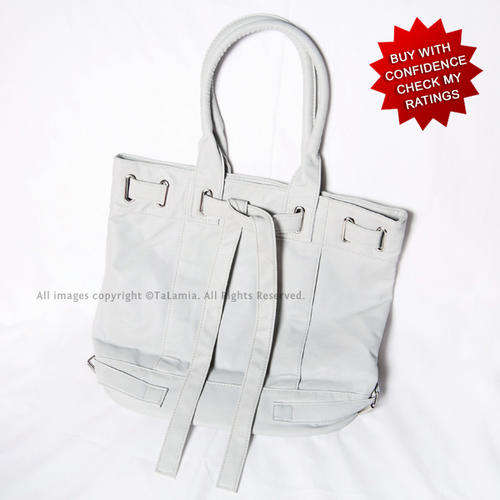 Soft light grey leatherette handbag with feminine bowtie