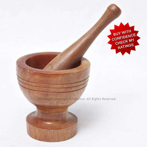 Old vintage wooden pestle and mortar set
