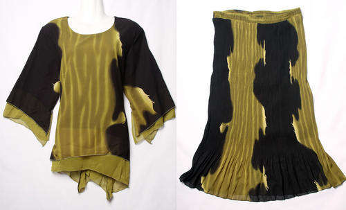 Stylish large fit wispy olive green and black ladies two piece top and long skirt set
