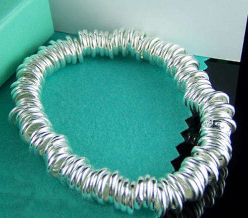 With FREE silver polishing cloth - Silver circles bracelet (compact)