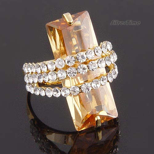 Encompassed champagne zircon ring