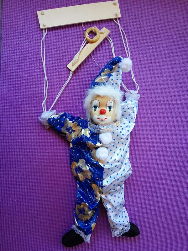 Marionette (String) Puppet on a Swing