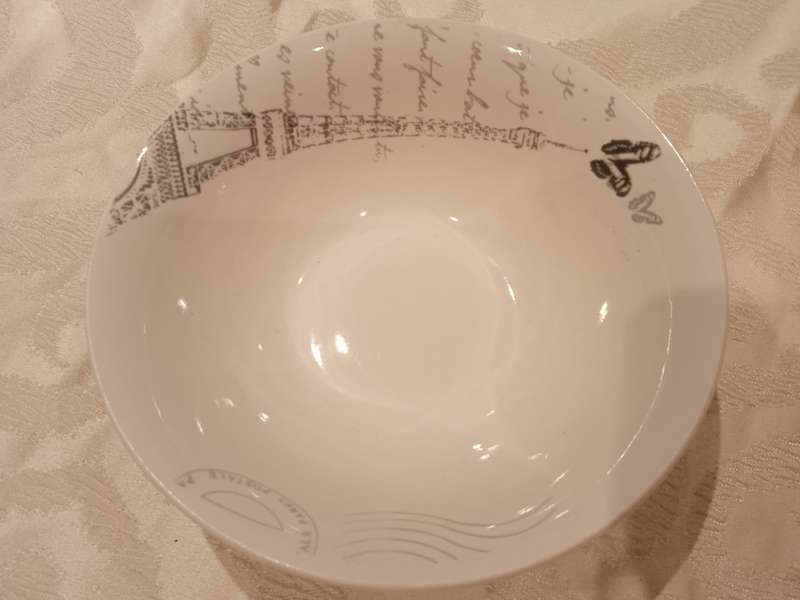 PARIS THEME DINNER SET (WAS 16 PIECE BUT NOW 14 PIECE BECAUSE TWO DINNER PLATES BROKE)