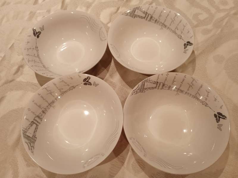 PARIS THEME DINNER SET (WAS 16 PIECE BUT NOW 14 PIECE BECAUSE TWO DINNER PLATES BROKE)
