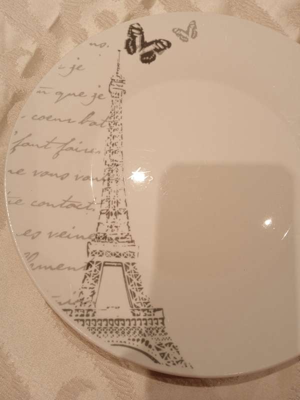 PARIS THEME DINNER SET (WAS 16 PIECE BUT NOW 14 PIECE BECAUSE TWO DINNER PLATES BROKE)